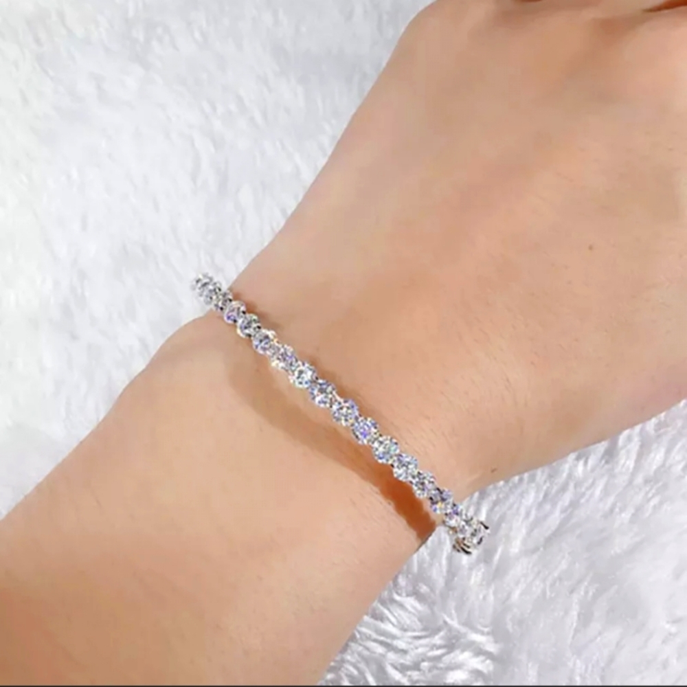 10k Moissanite Sterling Bangle-VVS1 D Fancy $645.00 offers ok but price is low